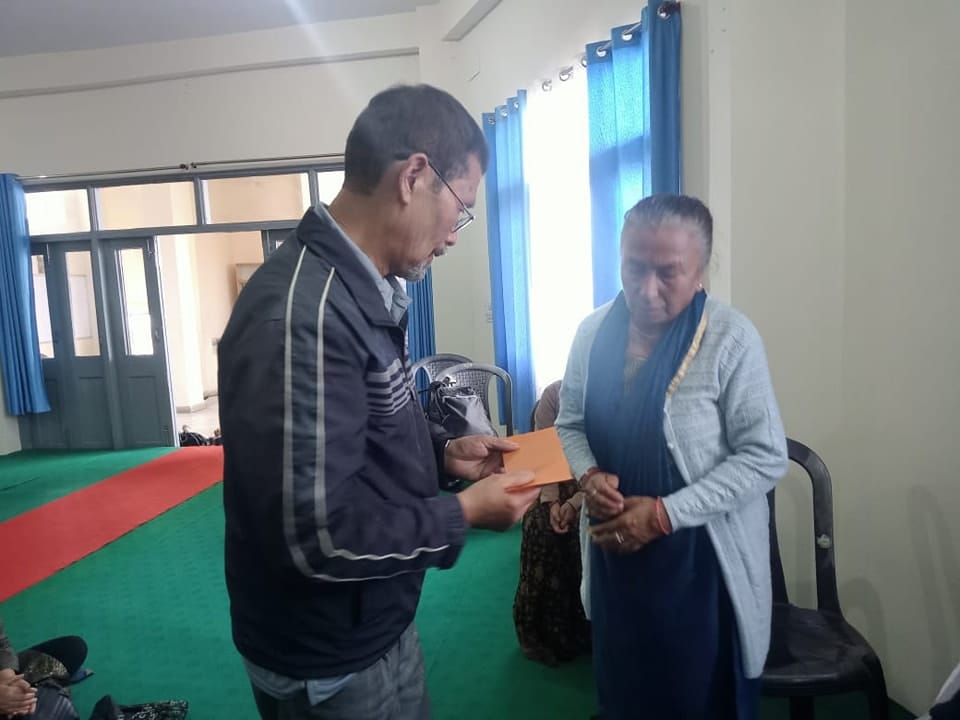 Image showing helping senior citizens with funds on a Elder care campaign by Kalpavriksha Welfare Society a NGO in Darjeeling.