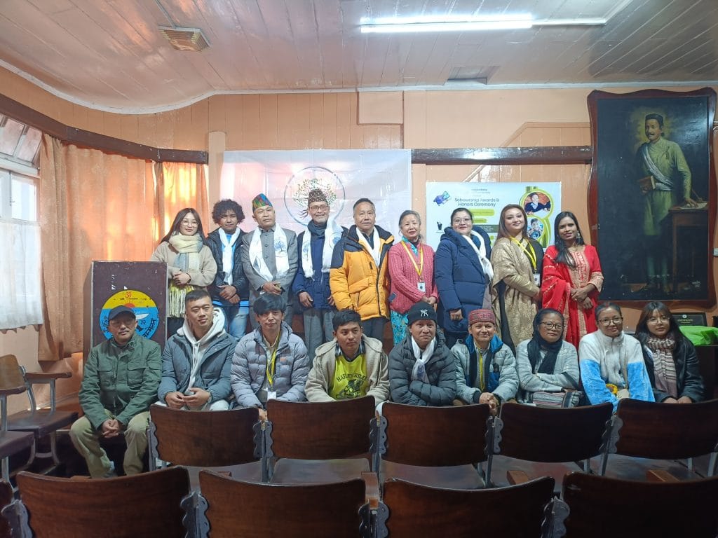 Image showing helping children with sholarship on a child care campaign by Kalpavriksha Welfare Society a NGO in Darjeeling.