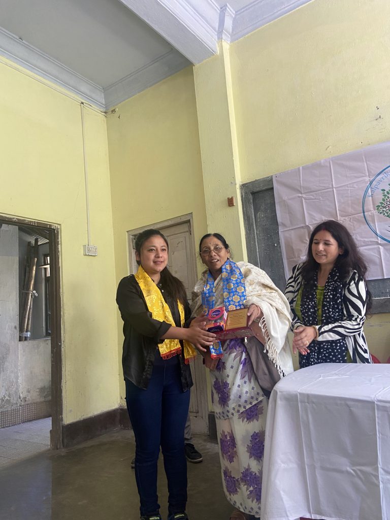 Image showing helping children with scholarship on a child care campaign by Kalpavriksha Welfare Society a NGO in Darjeeling.